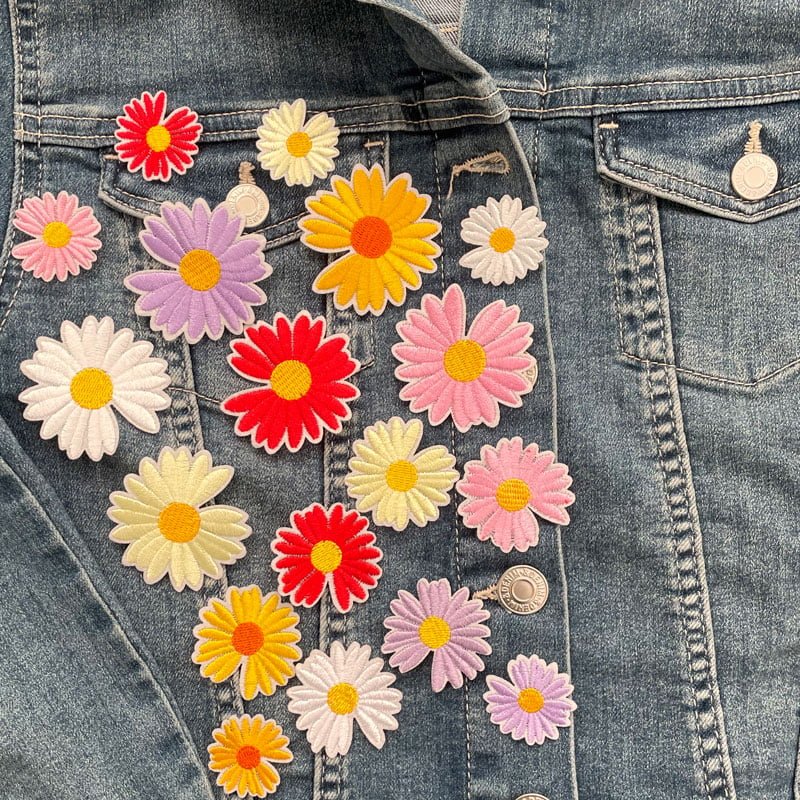 tygmärken blommor olika färger