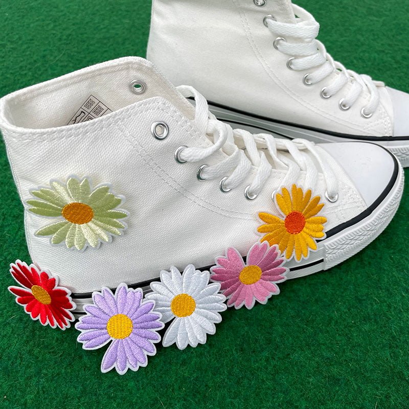 tygmärken gerbera på skor