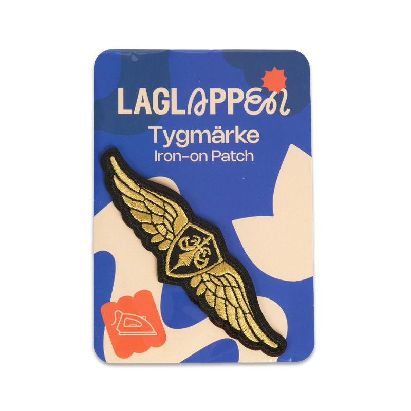 tygmärke vingar